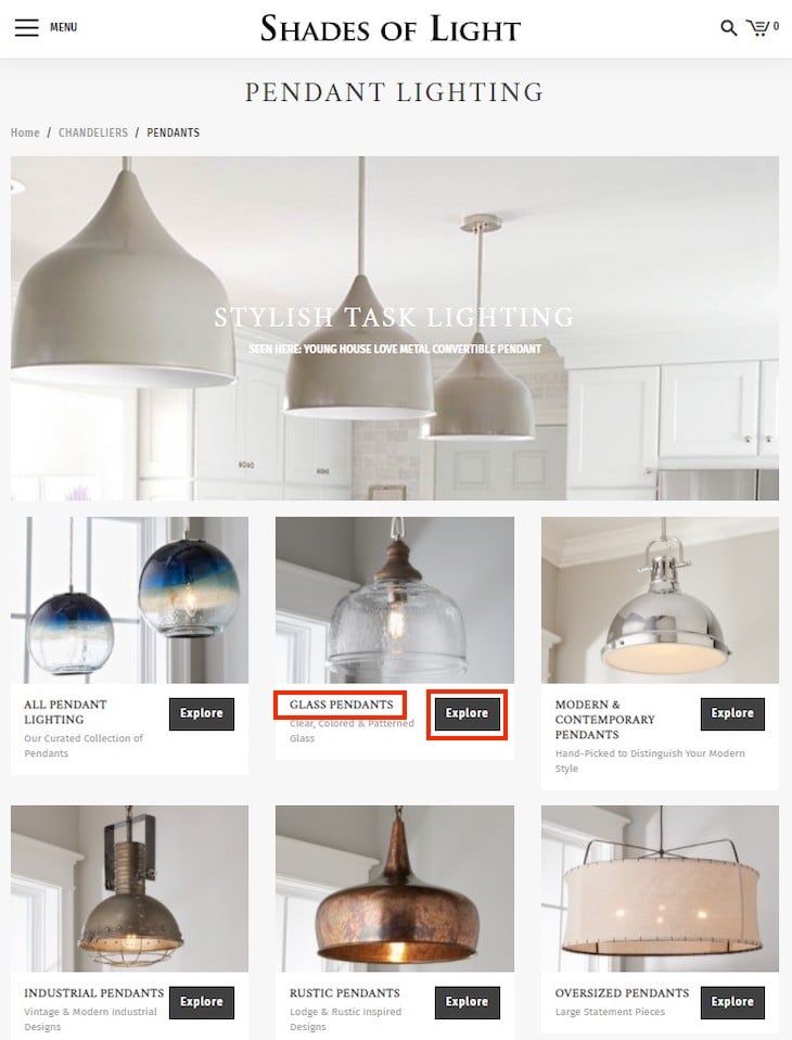 Shades of Light links from the "Pendant Lighting" category page to each subcategory using the word "Explore," which is meaningless to search engines. Importantly, however, the subcategory name, such as "Glass Pendants."