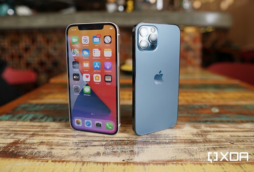 Apple iPhone 12 Front and Apple iPhone 12 Pro Blue standing on a table