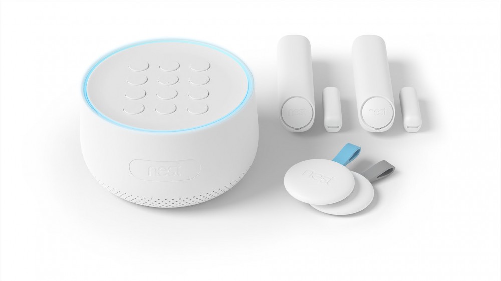 A Nest Secure device with trackers and keyfobs.