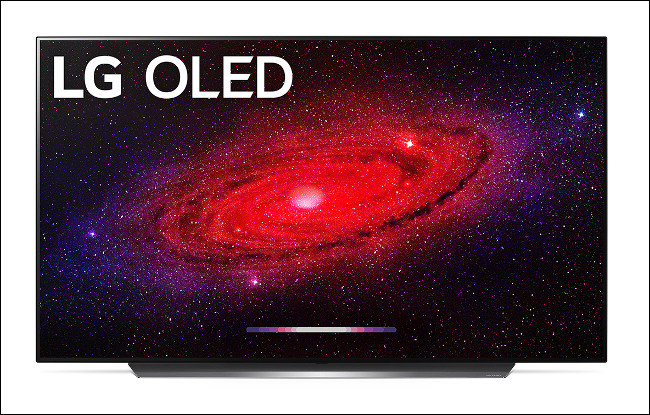 An LG CX OLED 2020 Flagship TV showing a scene from space.