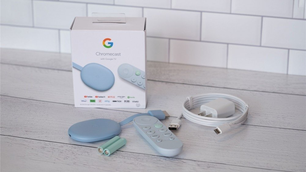 A photo of the Chromecast with Google TV and its box.