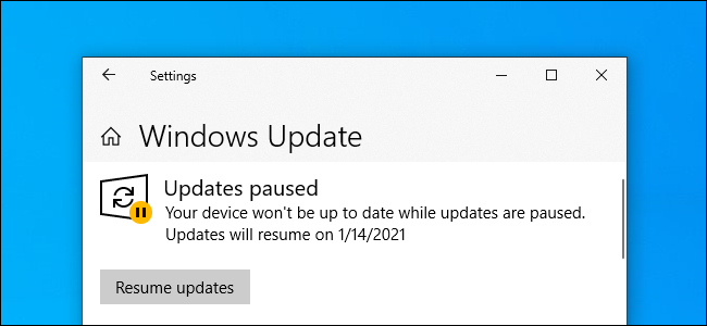 Windows Update showing "Updates paused" on Windows 10.