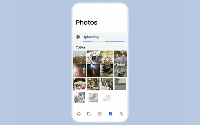 Dropbox introduces several new features, including free photo backup