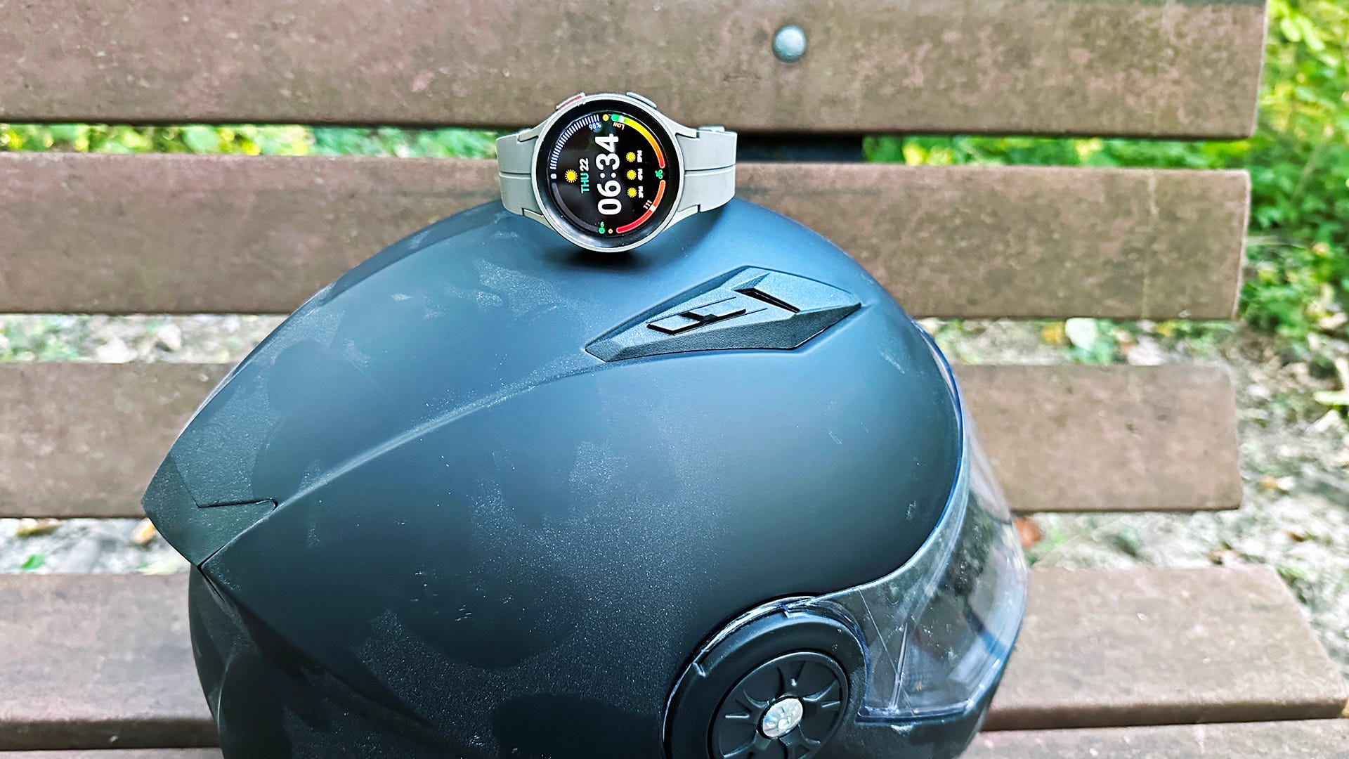 A Galaxy Watch 5 Pro on top of a helmet