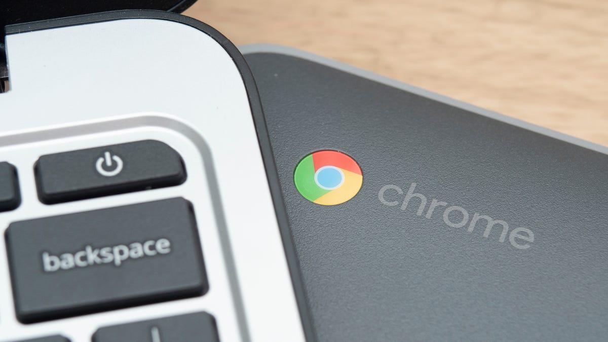 A close up photo of a Chromebook's power button.