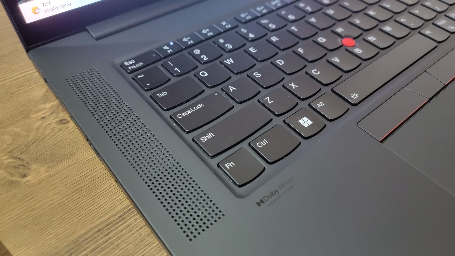 Close up of Lenovo ThinkPad X1 Extreme Gen 5 left speaker and keyboard