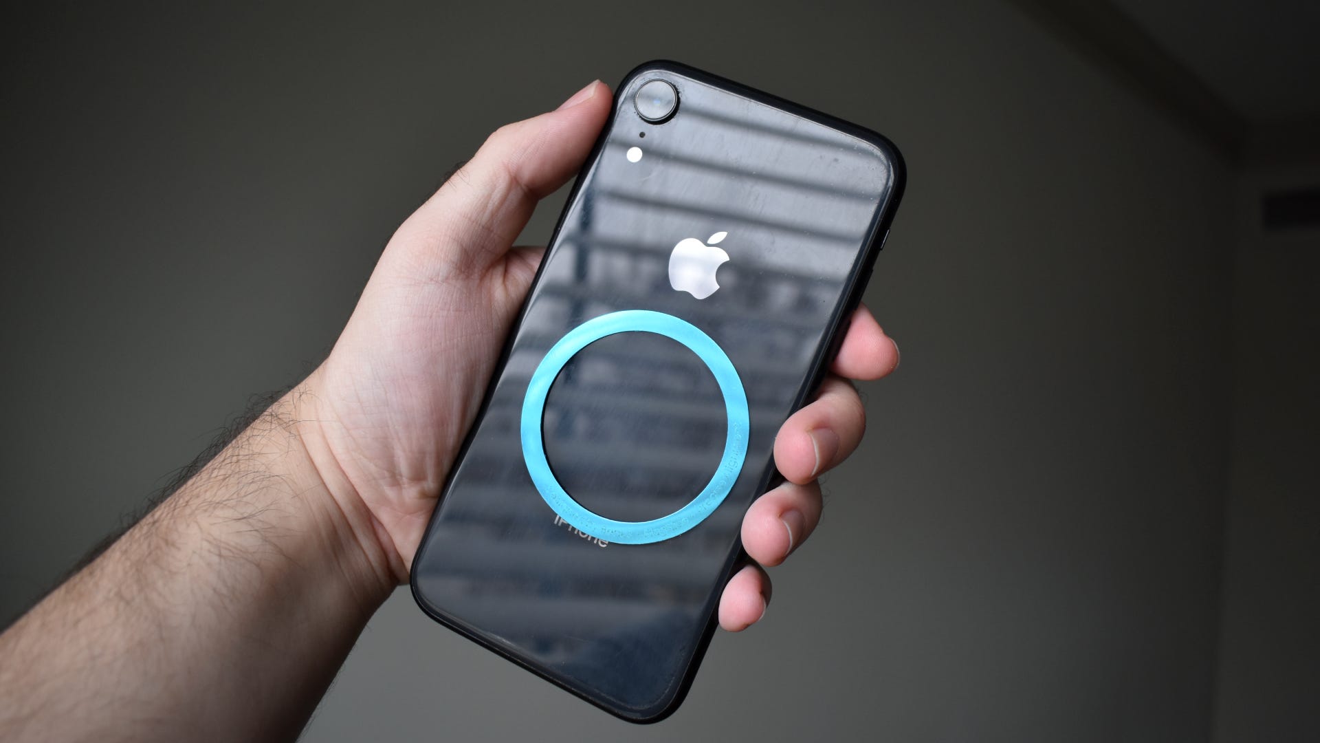 MagClap On-Go Power Bank magnetic ring on back of iPhone XR