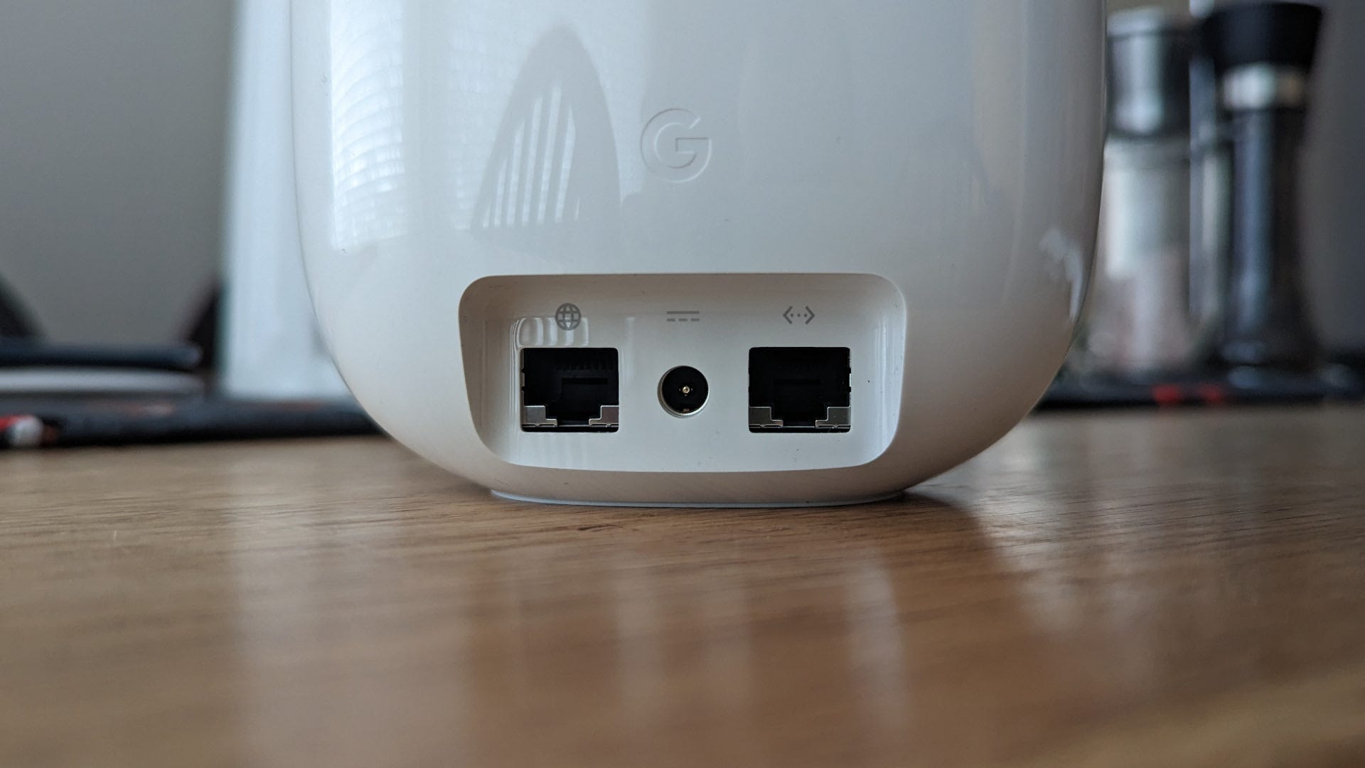 Closeup of the ports on the back of a Nest Wifi Pro mesh router.