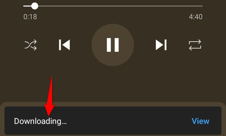 YouTube Music's "Downloading" message.