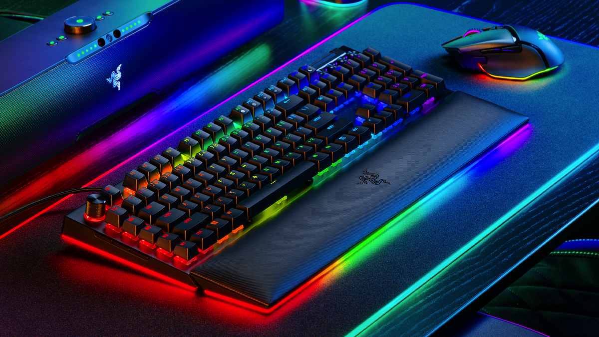 The Razer BlackWidow V4 Pro on a desk with tons of RGB lighting.