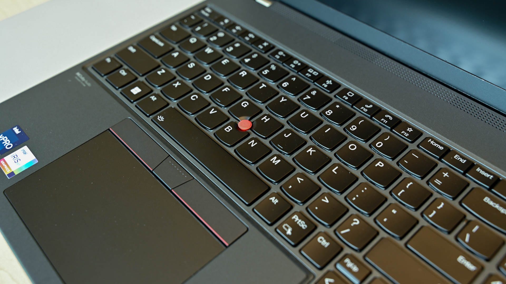 The red track point on the Lenovo ThinkPad T16 Gen 1.