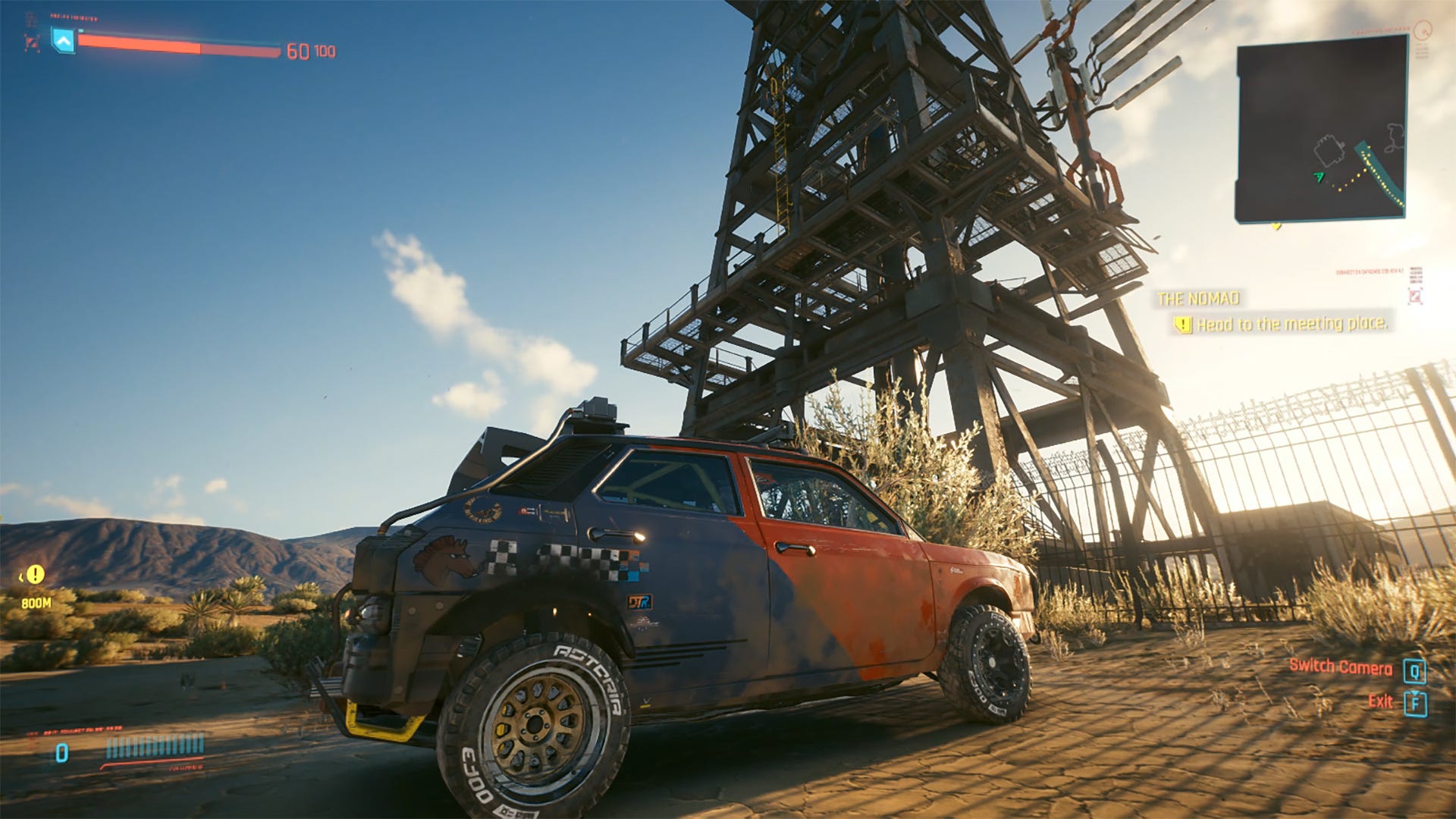 image of a video game car in a desert in "Cyberpunk 2077.".