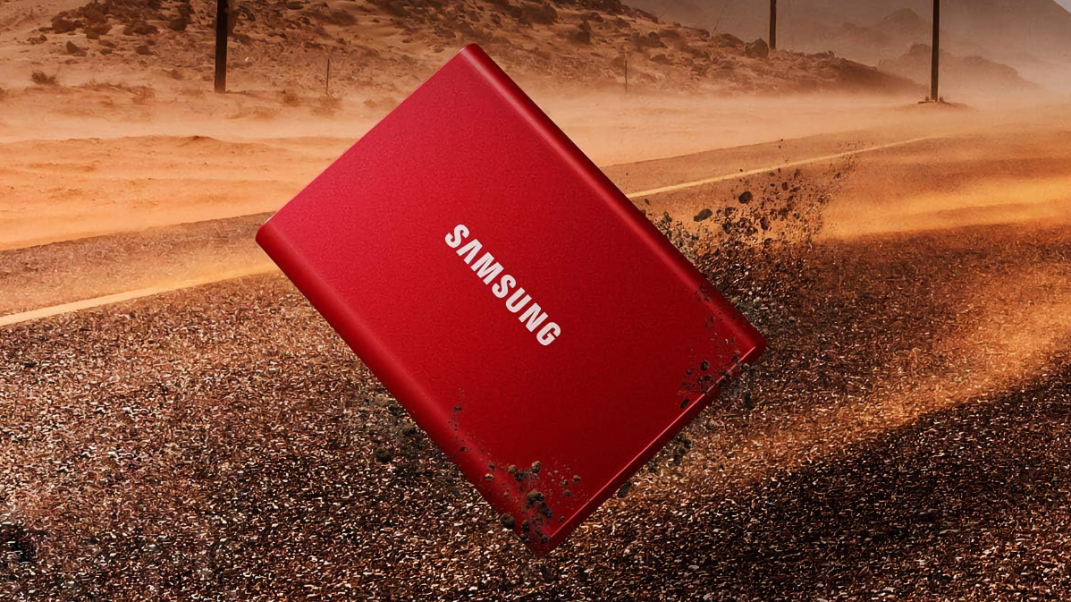 Samsung T7 SSD hovering over a dirt-covered road in a dry locale