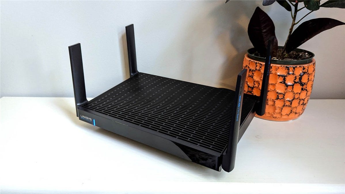 A Linksys Hydra Pro 6E Wi-Fi router on a table.