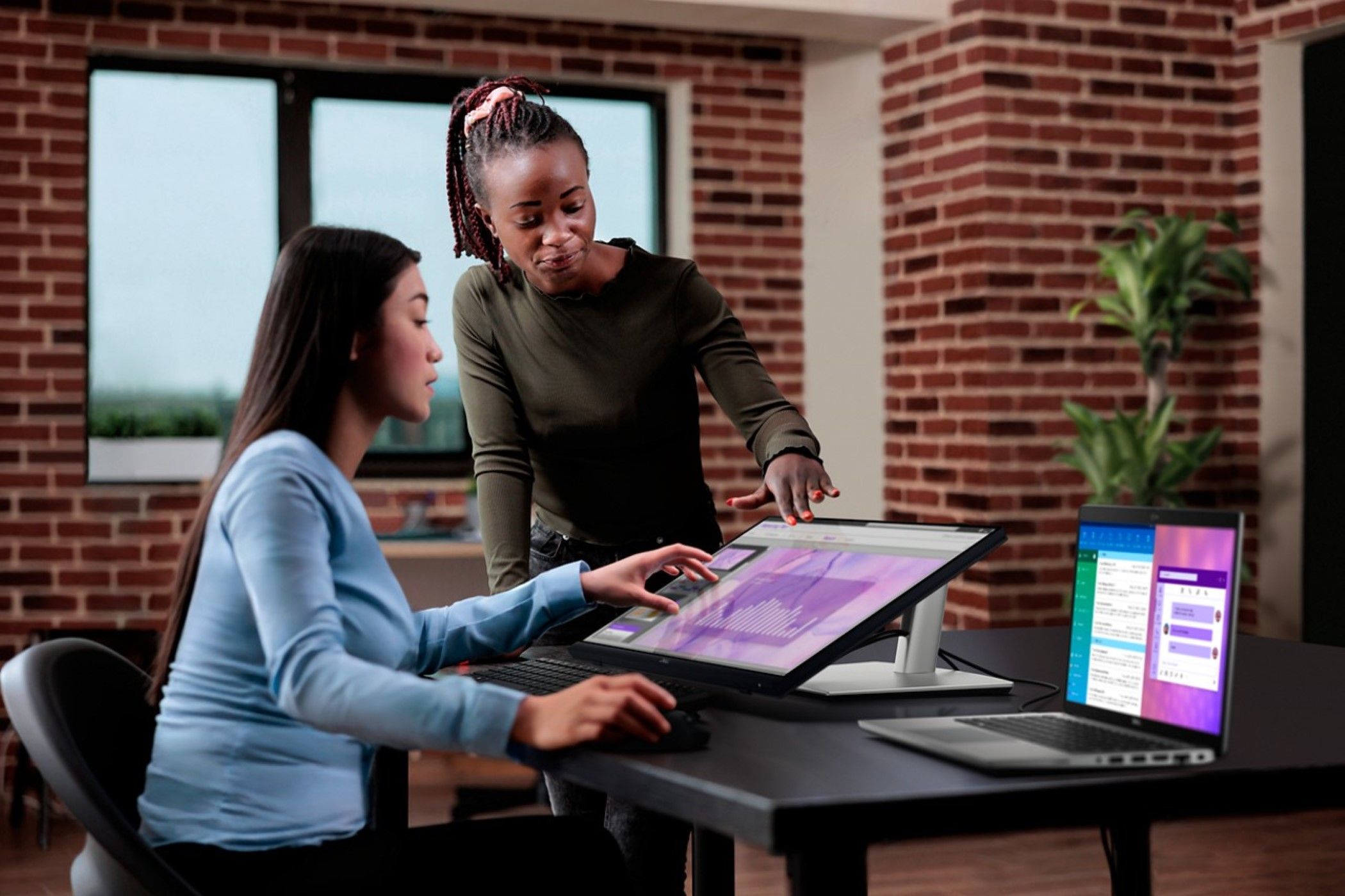 dell's-new-monitor-can-come-down-to-your-desk-and-supports-touch