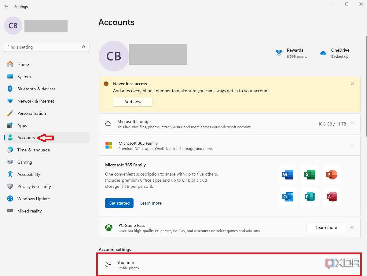 Windows 11 settings menu with accounts and your info selected