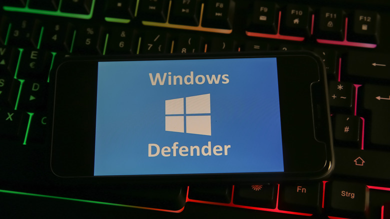 Windows Defender card on phone and keyboard