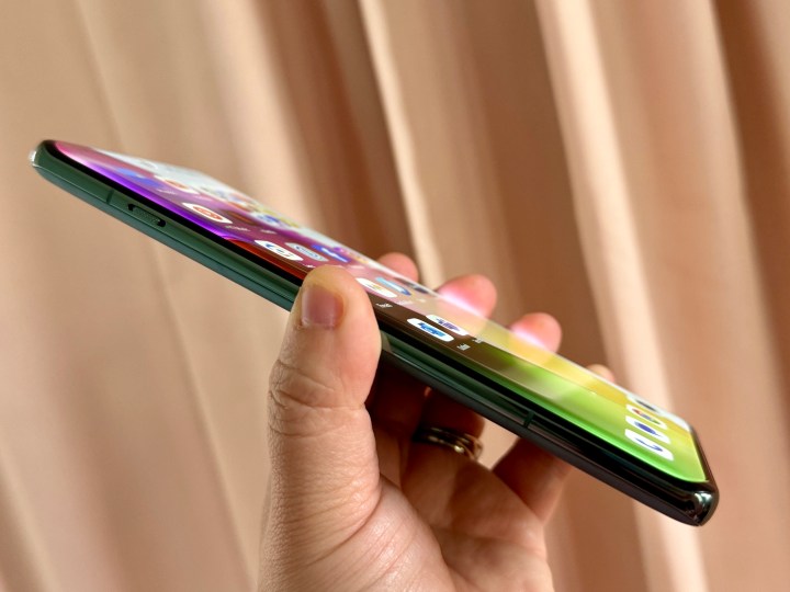 OnePlus 12 Flowy Emerald showing the curved display glass.