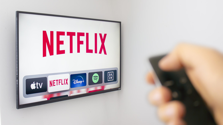 Remote pointing toward Netflix on tv
