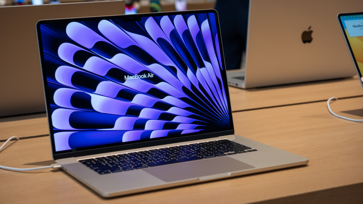 A photograph of a MacBook air on display in an Apple Store